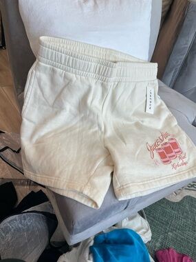 PacSun Cream Lounge Shorts with Pink Graphic